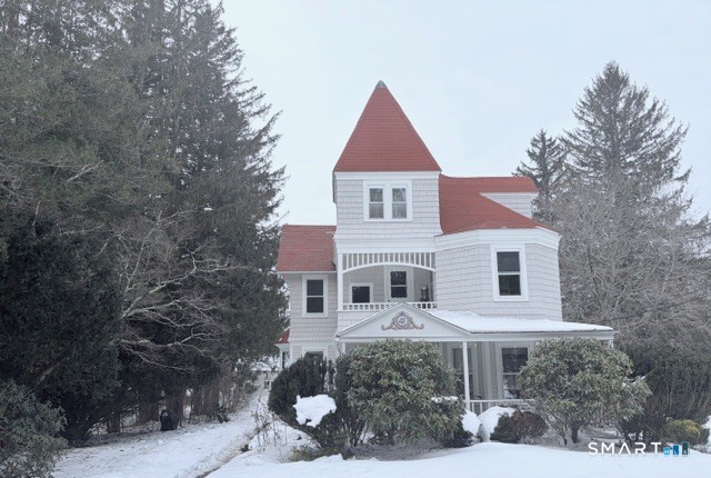 41 Maple Avenue Norfolk, CT 06058 - Photo 2 of 8 a front view of a house with a yard