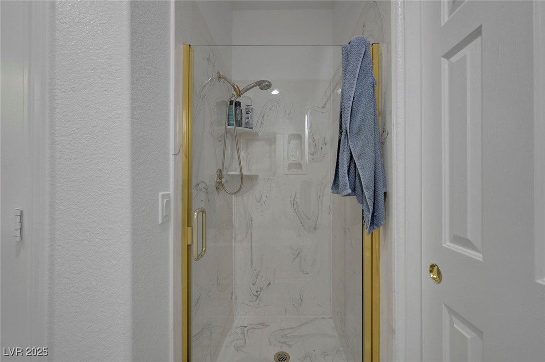 770 Fairway Drive Boulder City, NV 89005 - Photo 34 of 61 Full bathroom with a marble finish shower