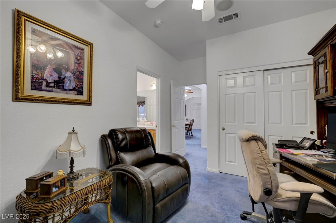 770 Fairway Drive Boulder City, NV 89005 - Photo 46 of 61 Carpeted home office featuring ceiling fan and arched walkways