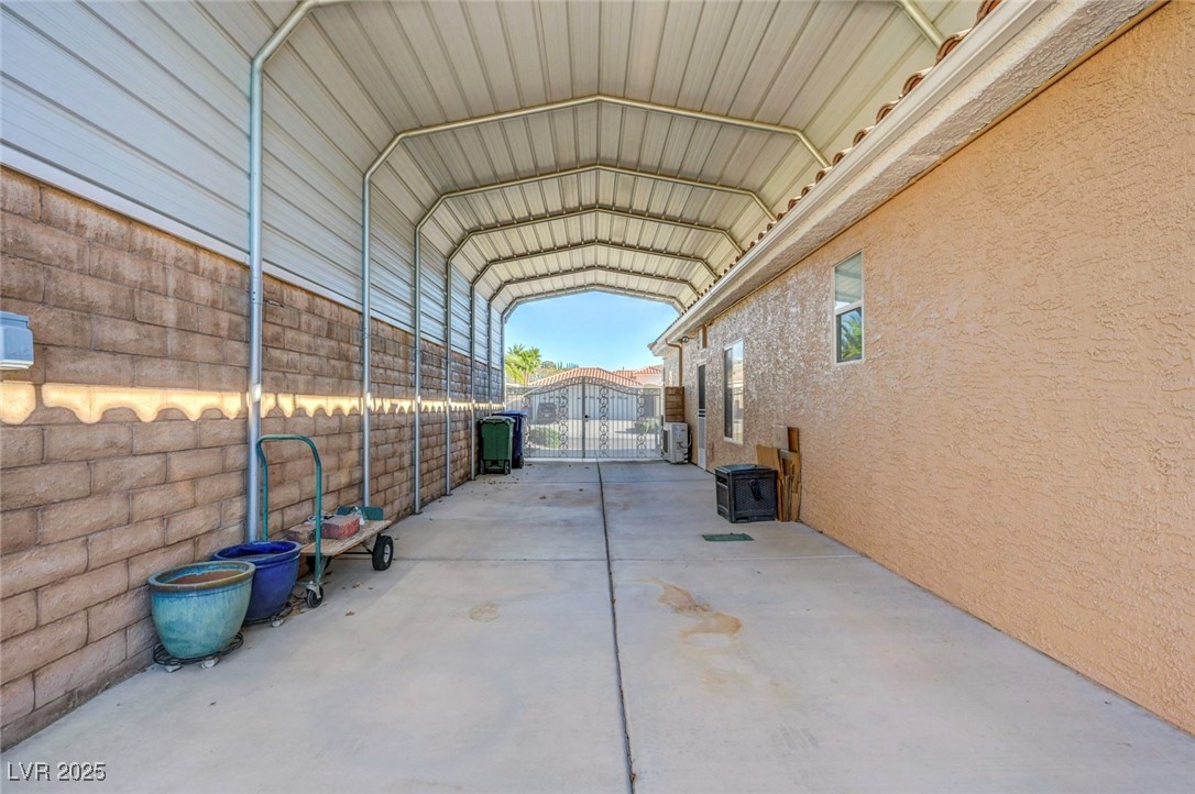 770 Fairway Drive Boulder City, NV 89005 - Photo 53 of 61 View of car parking featuring a gate