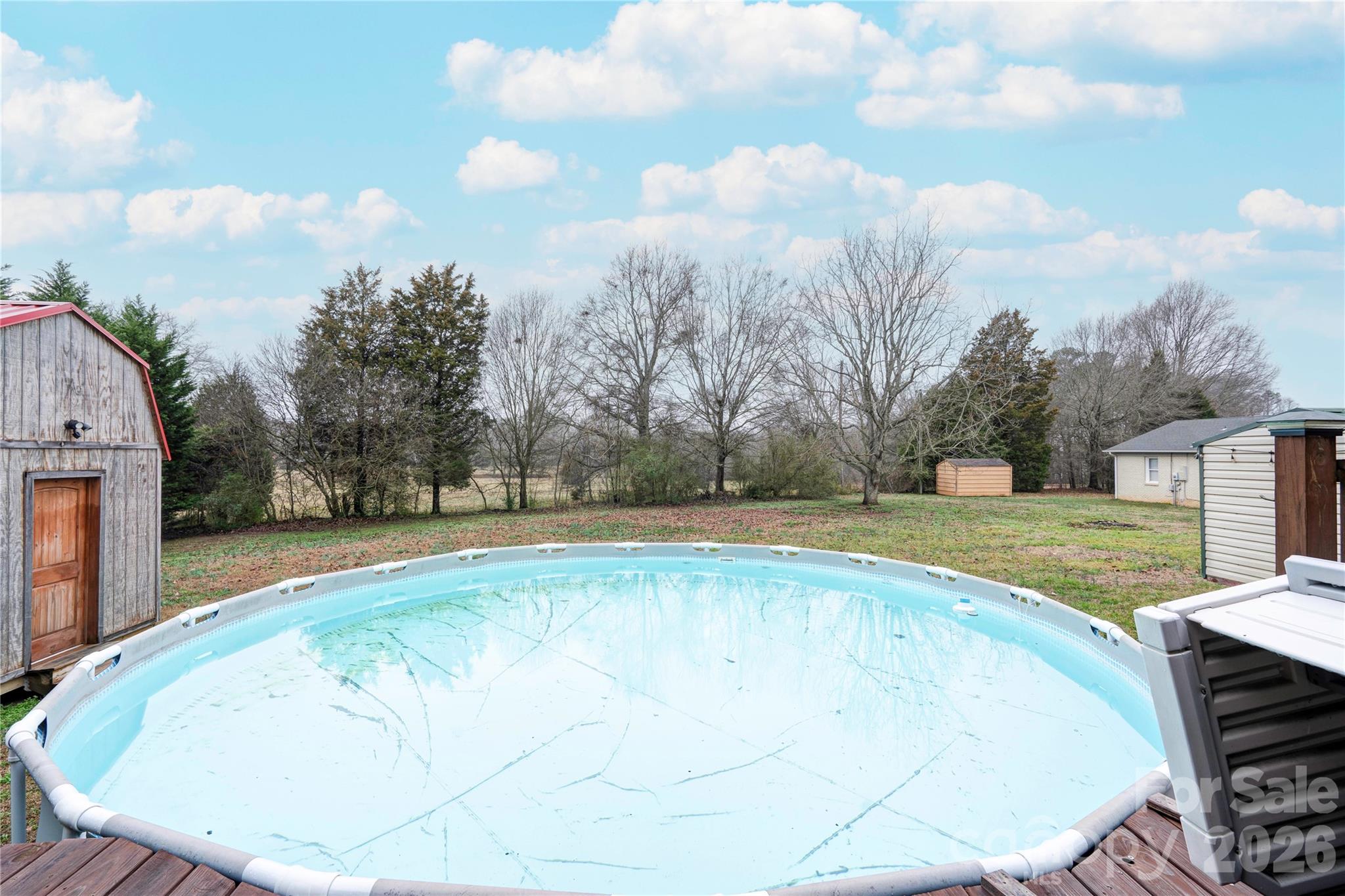 111 Hicks Road Grover, NC 28073 - Photo 30 of 35 a view of a swimming pool with a yard
