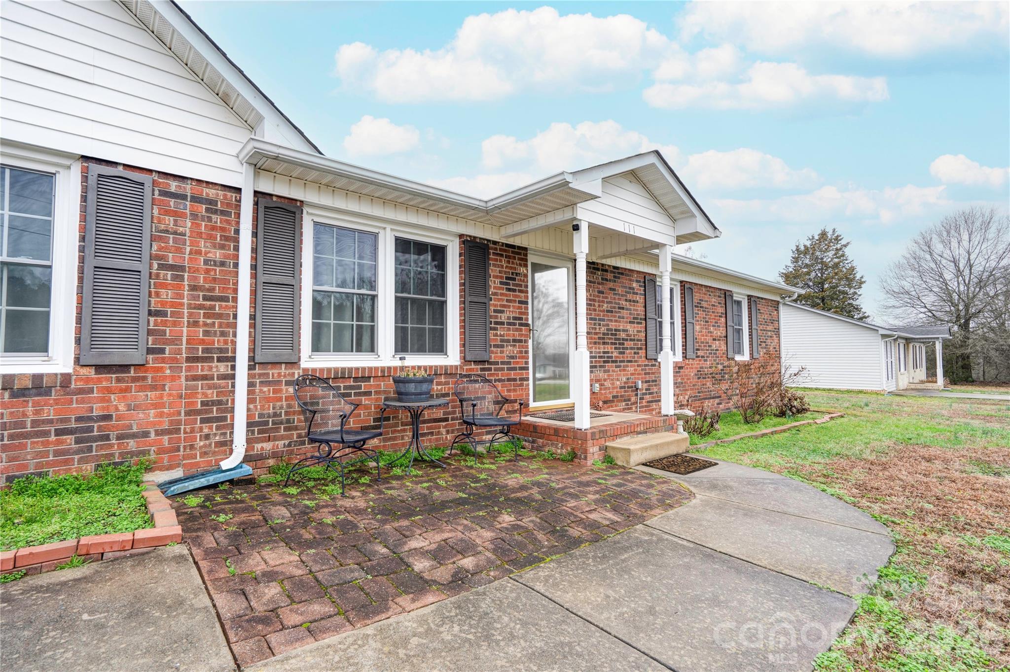 111 Hicks Road Grover, NC 28073 - Photo 3 of 35 a front view of a house with garden