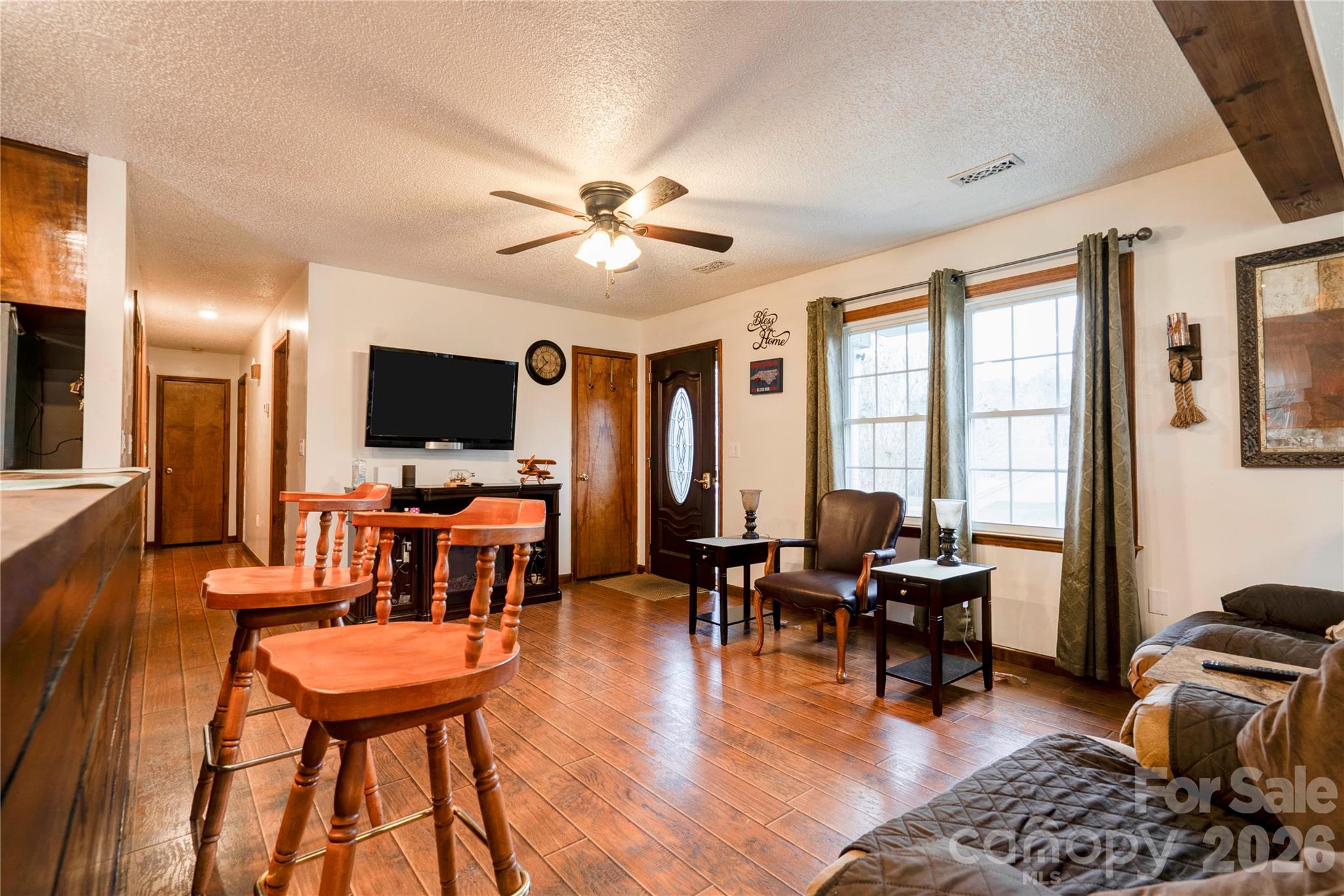 111 Hicks Road Grover, NC 28073 - Photo 6 of 35 a living room with furniture and a flat screen tv