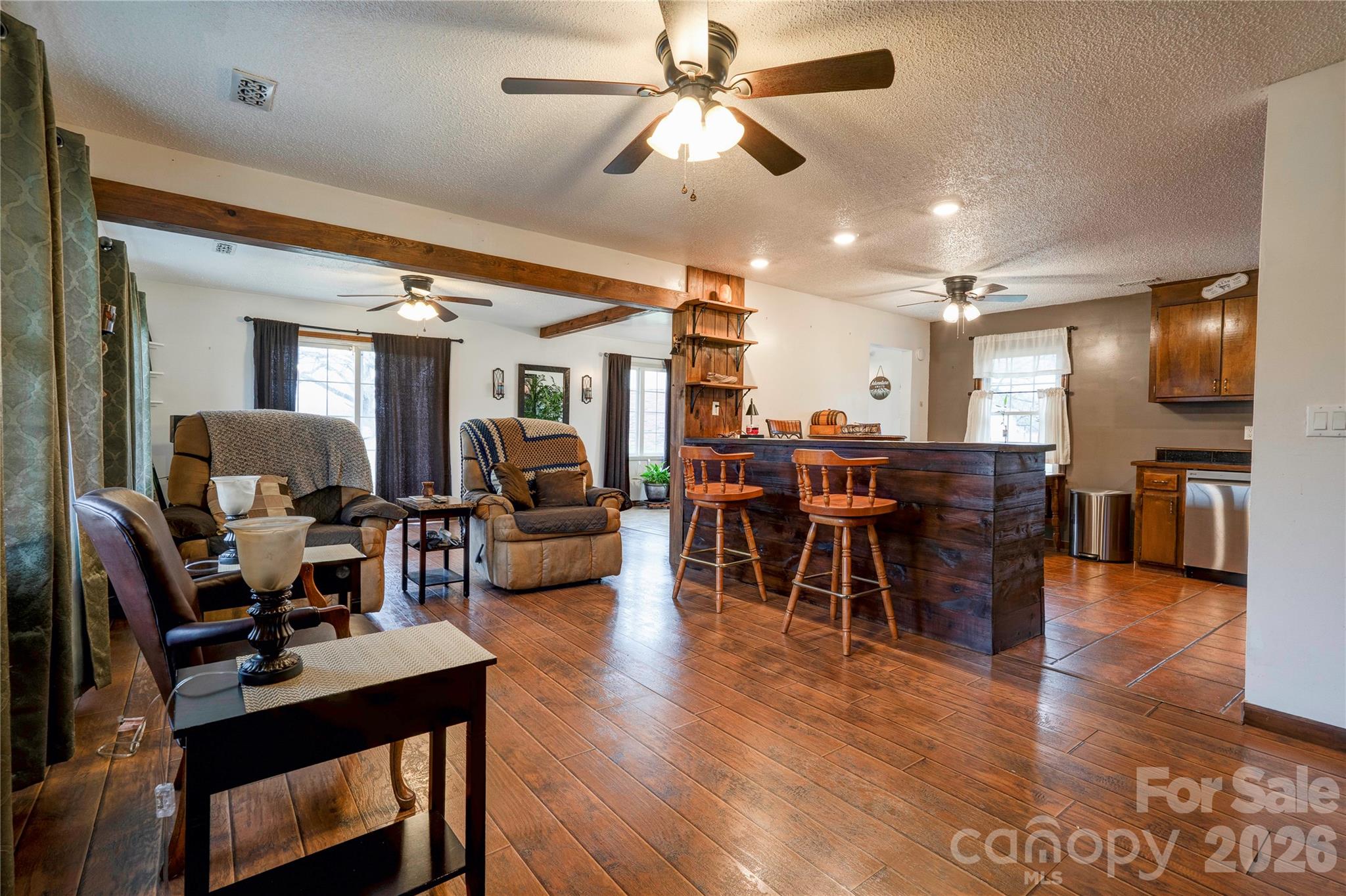 111 Hicks Road Grover, NC 28073 - Photo 7 of 35 a view of a dining room with furniture wooden floor and chandelier