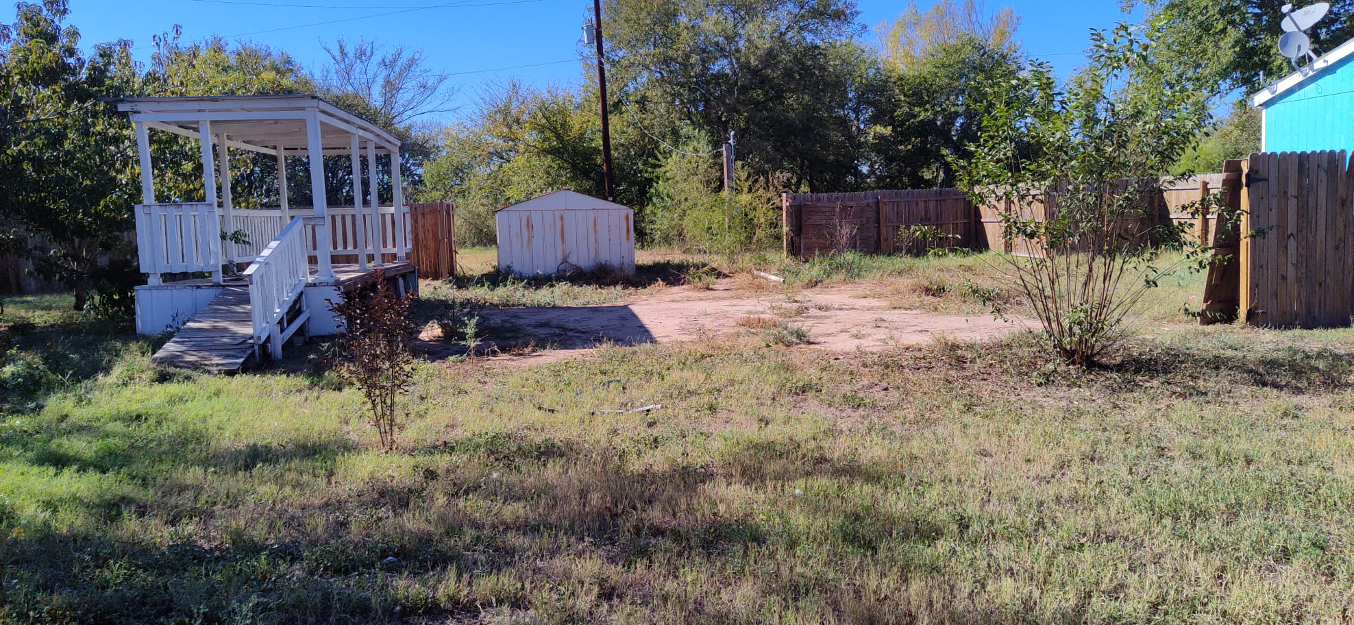 8922 Witter Lane Temple, TX 76502 - Photo 14 of 15 a backyard of a house with table and chairs