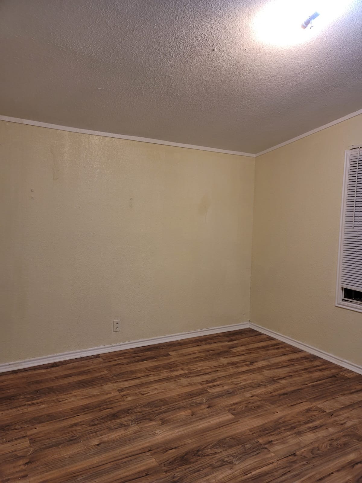 8922 Witter Lane Temple, TX 76502 - Photo 8 of 15 a view of an empty room with wooden floor
