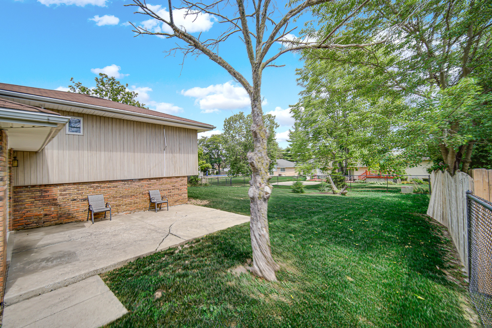 3519 Arthur Road Crete, IL 60417 - Photo 16 of 17 a house with green field in front of it