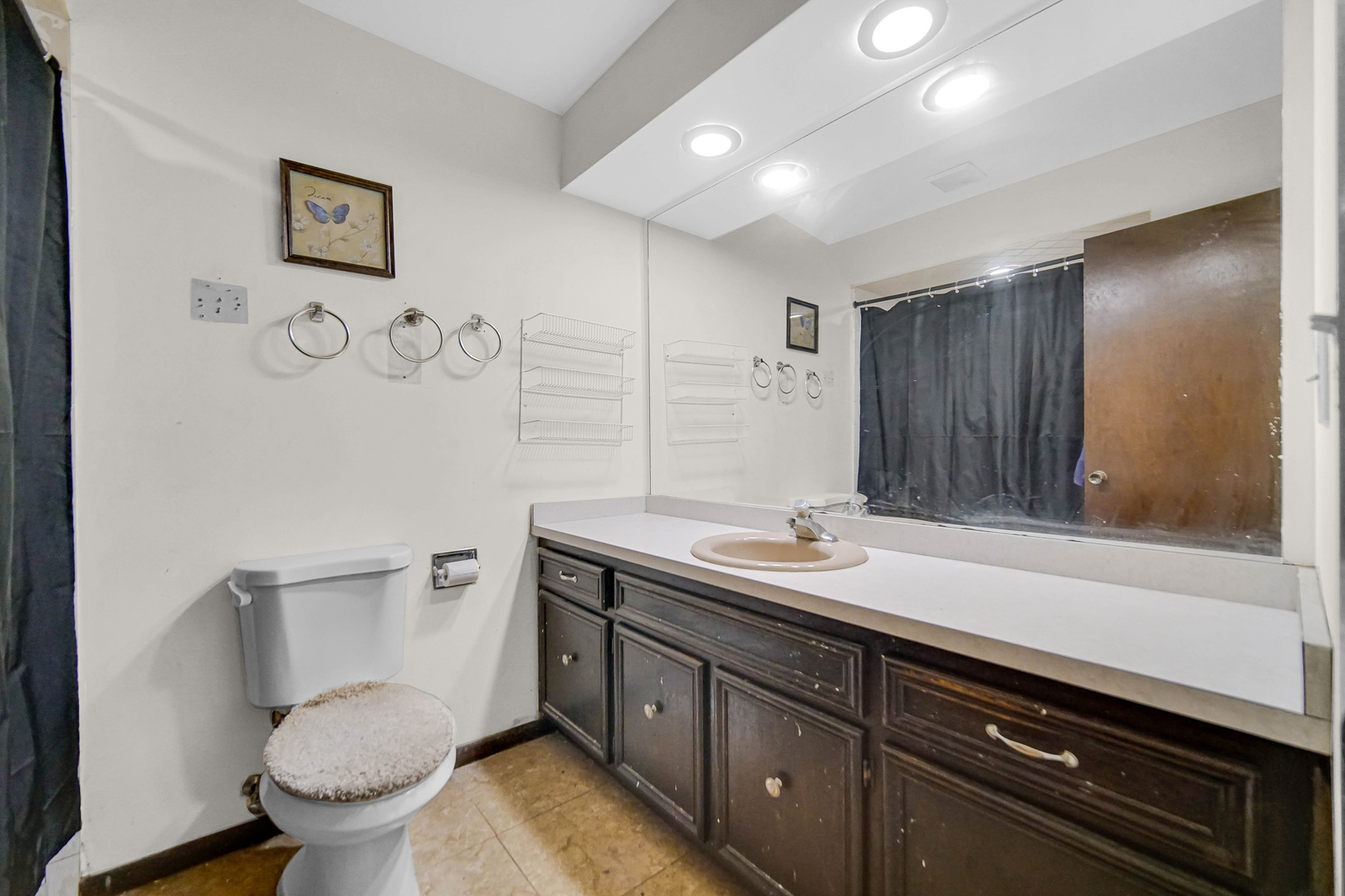 3519 Arthur Road Crete, IL 60417 - Photo 10 of 17 a bathroom with a granite countertop toilet sink and mirror