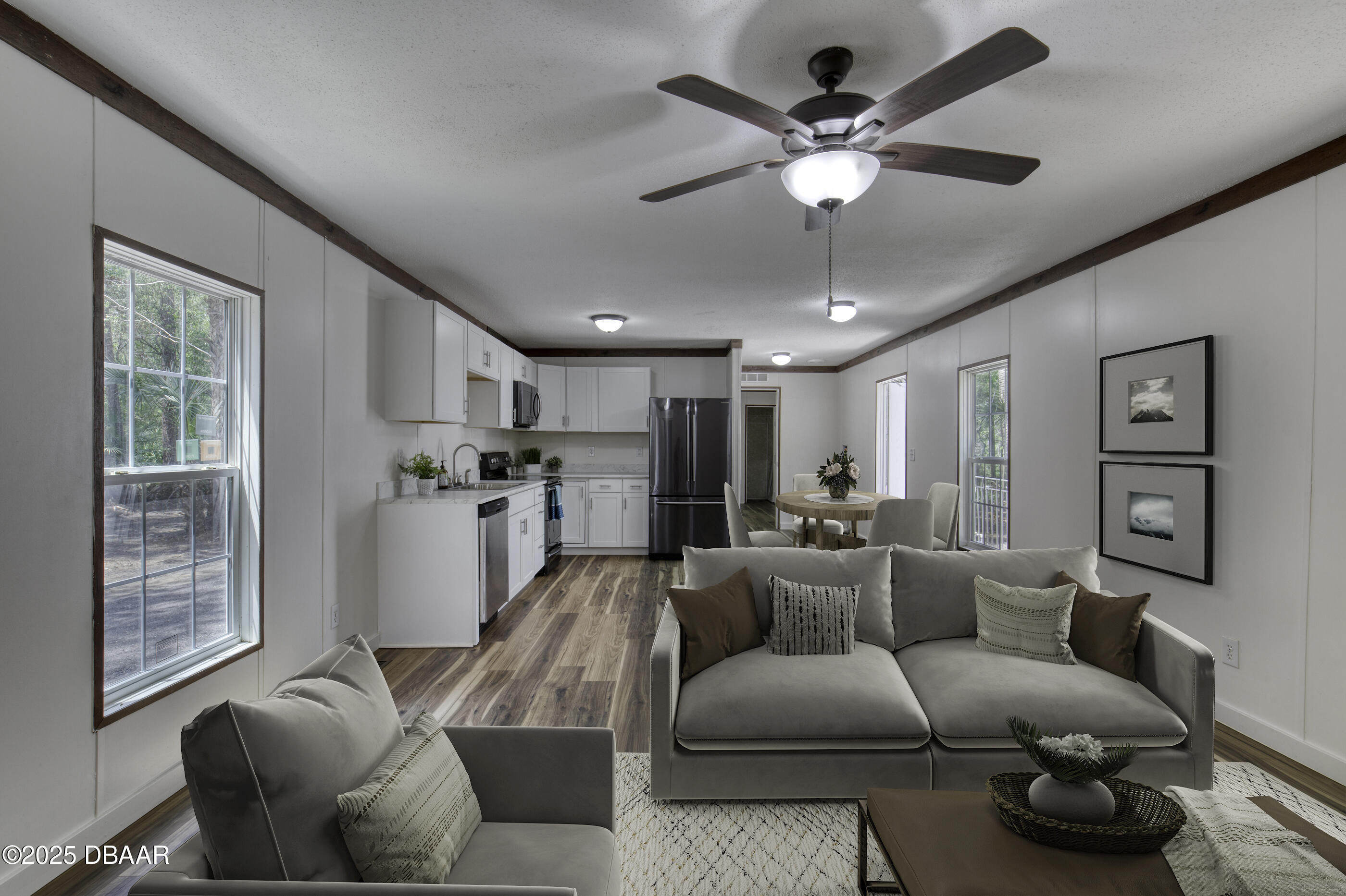 2089 Guava Lane Bunnell, FL 32110 - Photo 15 of 58 a living room with furniture and a large window