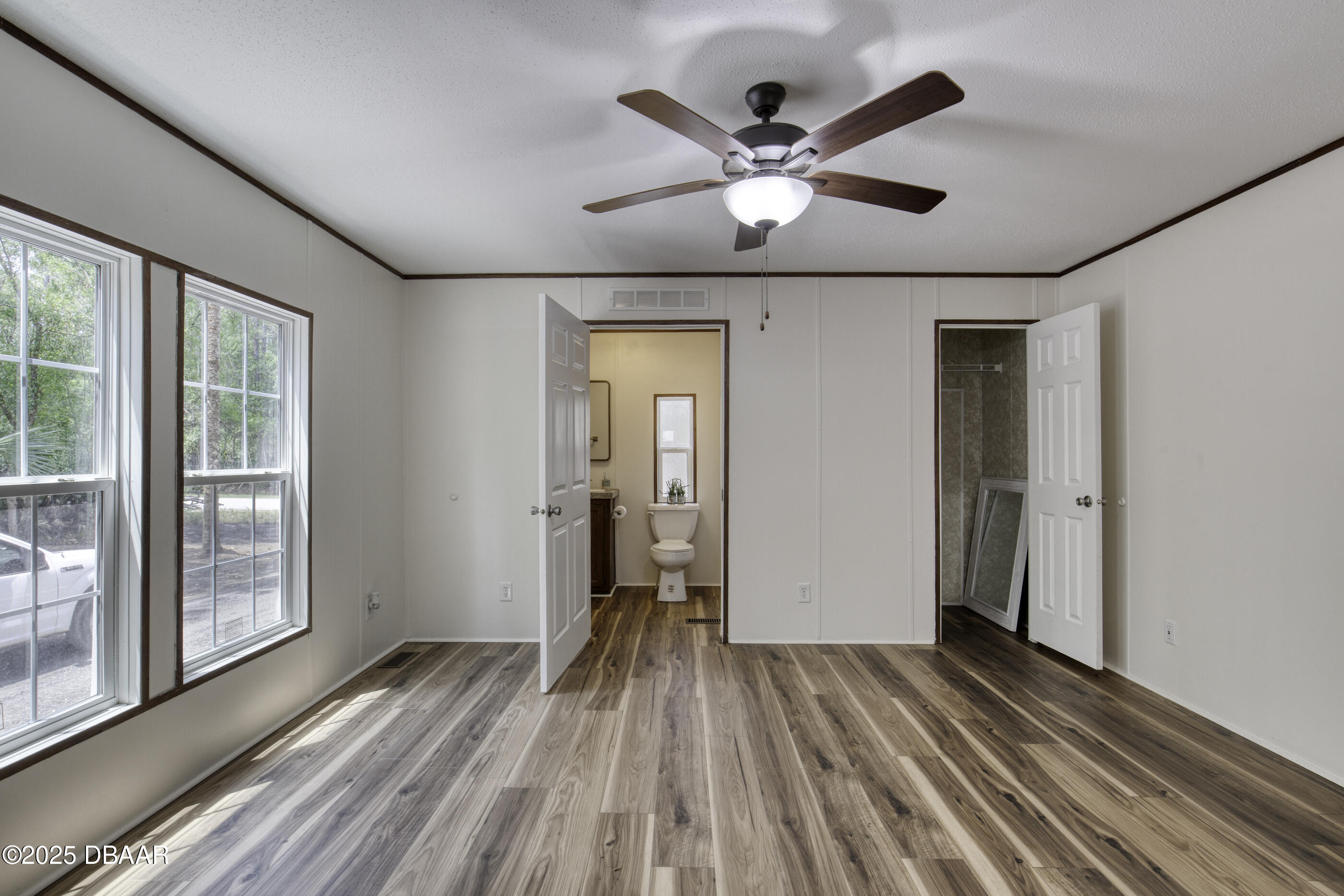 2089 Guava Lane Bunnell, FL 32110 - Photo 27 of 58 a view of a livingroom with a hardwood floor