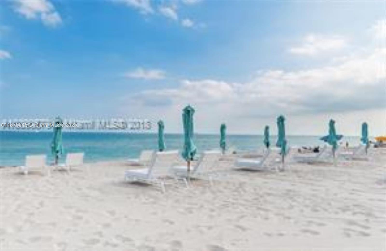 3710 Collins Avenue, Unit N103 Miami Beach, FL 33140 - Photo 43 of 53 a view of a lake with a nearby beach