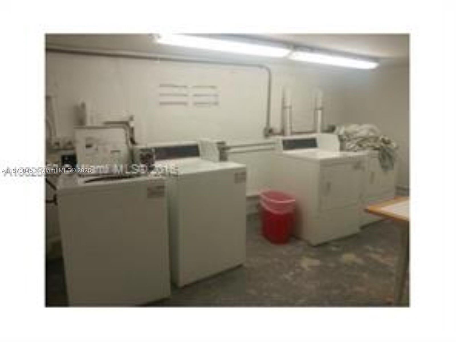 3710 Collins Avenue, Unit N103 Miami Beach, FL 33140 - Photo 47 of 53 a bathroom with a sink and a mirror