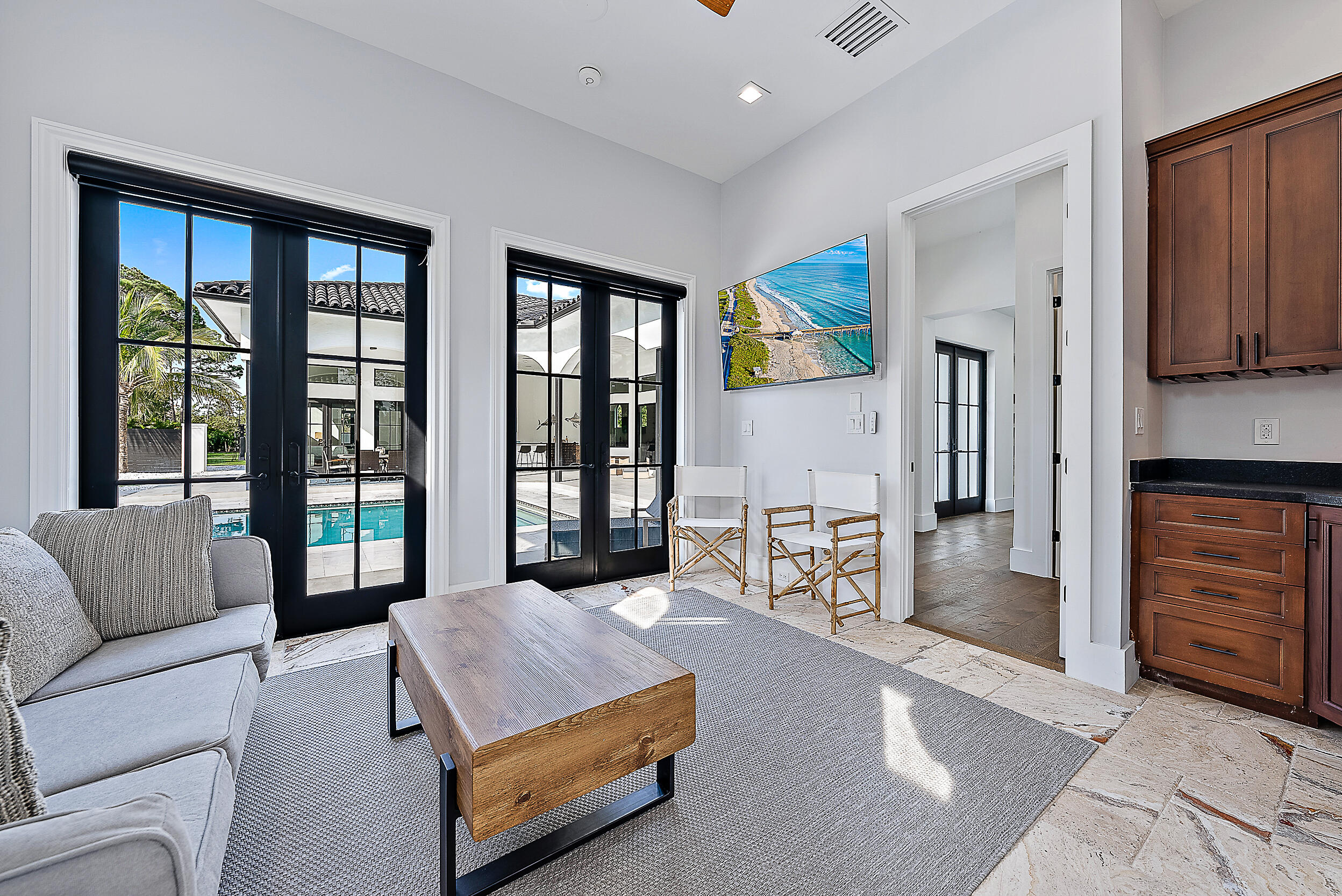 18890 Southeast Jupiter Road Jupiter, FL 33458 - Photo 20 of 33 a living room with furniture and large window