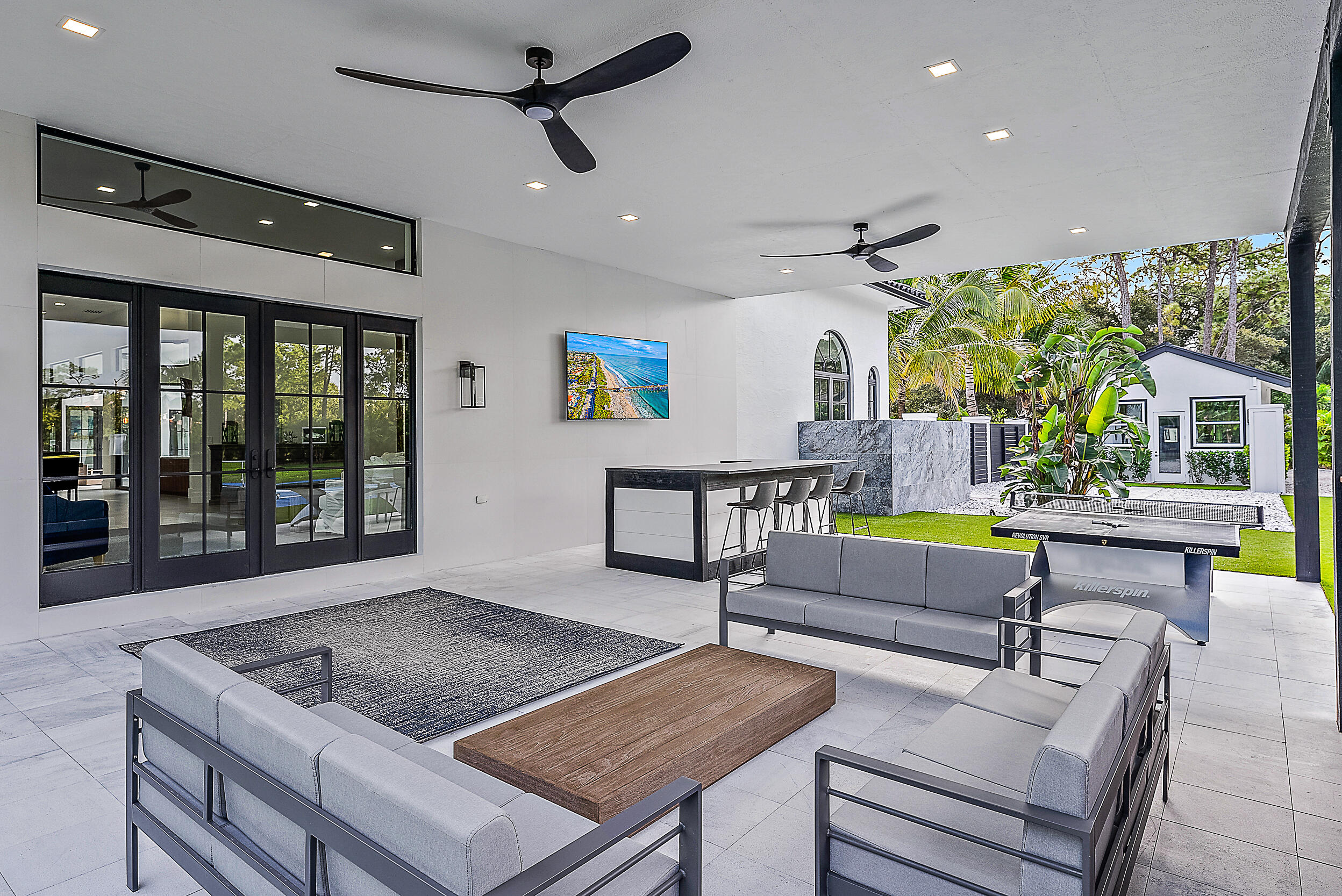 18890 Southeast Jupiter Road Jupiter, FL 33458 - Photo 30 of 33 a living room with furniture and window