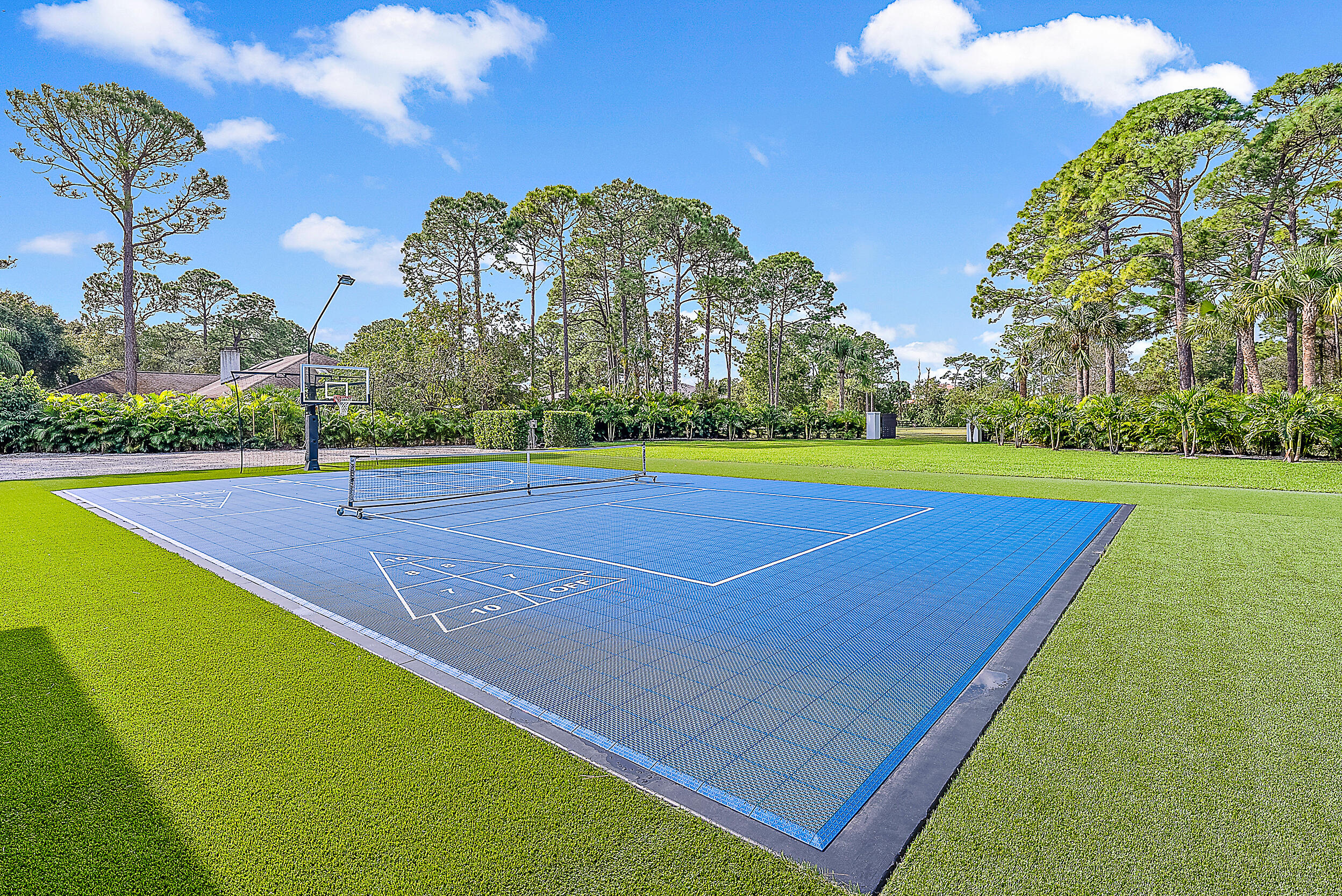 18890 Southeast Jupiter Road Jupiter, FL 33458 - Photo 31 of 33 a view of a tennis court