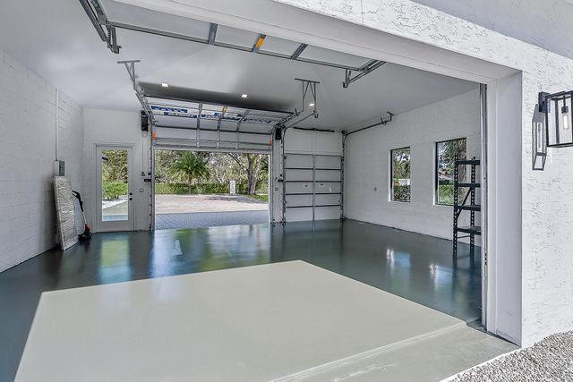 an aerial view of a house with a garden