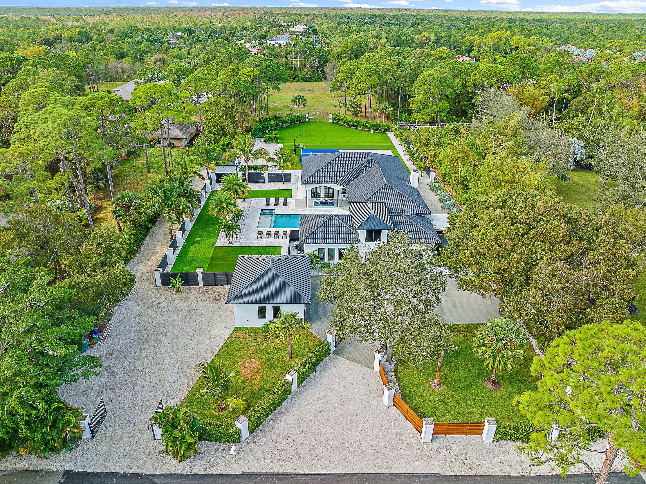 18890 Southeast Jupiter Road Jupiter, FL 33458 - Photo 33 of 33 an aerial view of a house with a garden