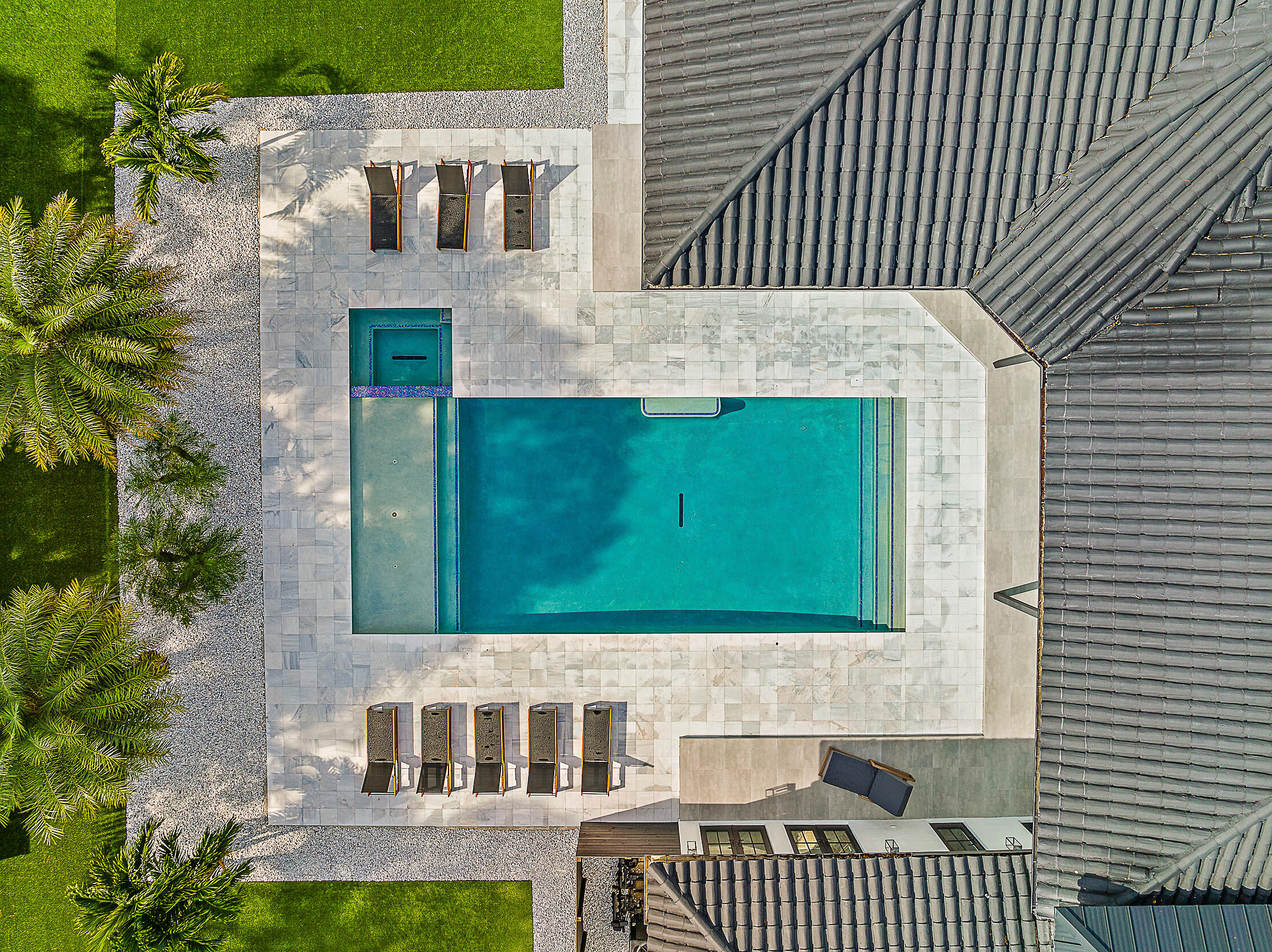 18890 Southeast Jupiter Road Jupiter, FL 33458 - Photo 4 of 33 a view of a brick house with a yard