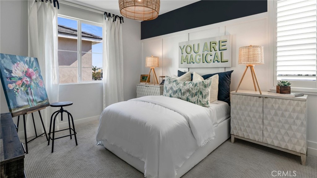 2016 Dewdrop Upland, CA 91786 - Photo 11 of 16 a bedroom with a bed and a window