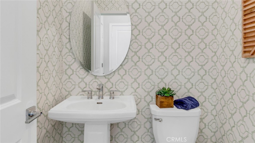 2016 Dewdrop Upland, CA 91786 - Photo 12 of 16 a bathroom with a sink and a mirror