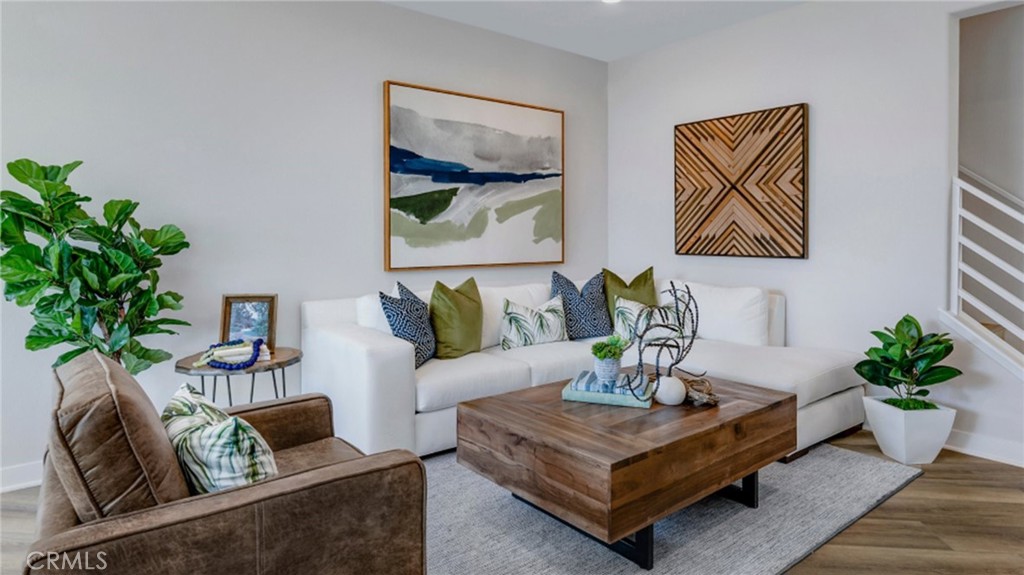 2016 Dewdrop Upland, CA 91786 - Photo 2 of 16 a living room with furniture potted plant and window