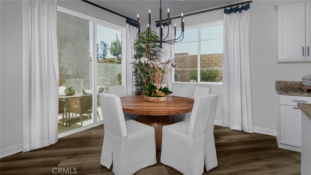 2016 Dewdrop Upland, CA 91786 - Photo 5 of 16 a view of a dining room with furniture window and wooden floor