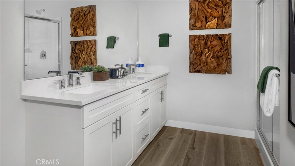 2016 Dewdrop Upland, CA 91786 - Photo 7 of 16 a bathroom with a sink and a mirror