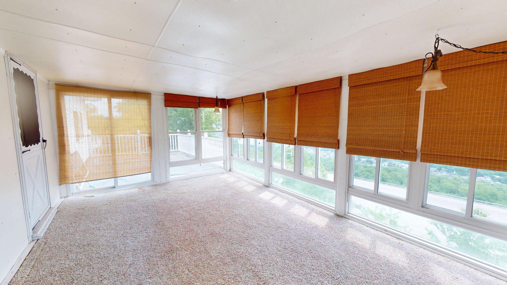 505 Big Ridge Road Lewistown, PA 17044 - Photo 8 of 31 Bright sunroom with panoramic views.