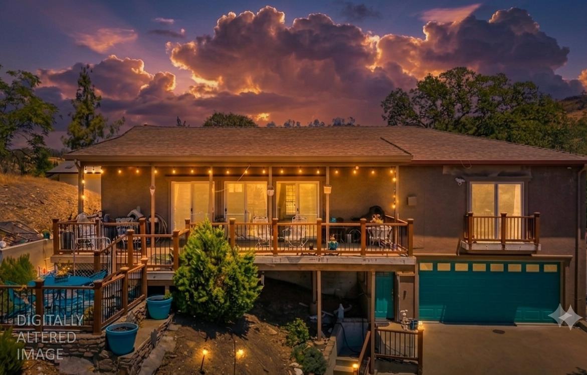 411 Sunrise Road Copperopolis, CA 95228 - Photo 3 of 76 Cozy evening ambiance can be enjoyed here as you watch the sunset over Lake Tulloch!