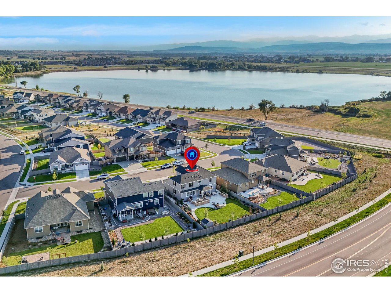 1687 Rivergate Way Berthoud, CO 80513 - Photo 17 of 39 a view of an ocean and beach