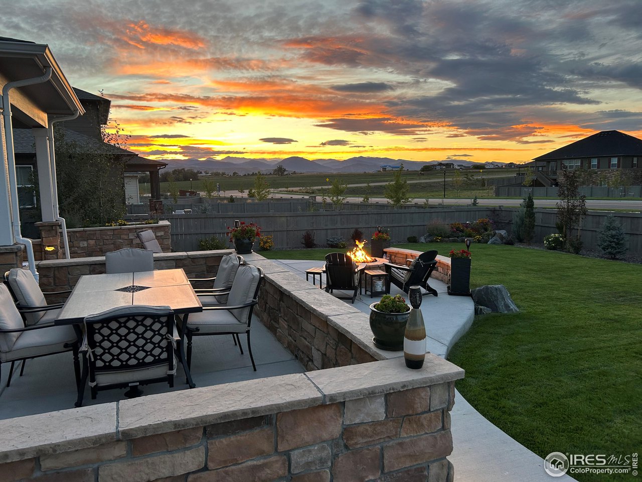 1687 Rivergate Way Berthoud, CO 80513 - Photo 38 of 39 a view of a terrace with couches and pool