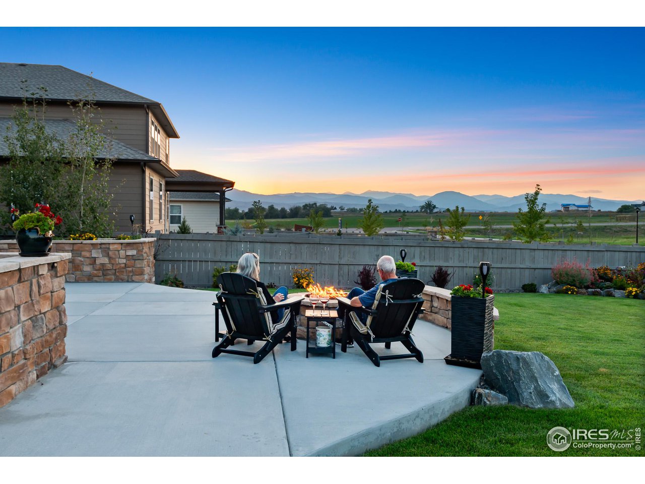 1687 Rivergate Way Berthoud, CO 80513 - Photo 4 of 39 a terrace of a house with outdoor seating