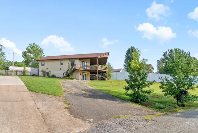 a view of a back yard of the house