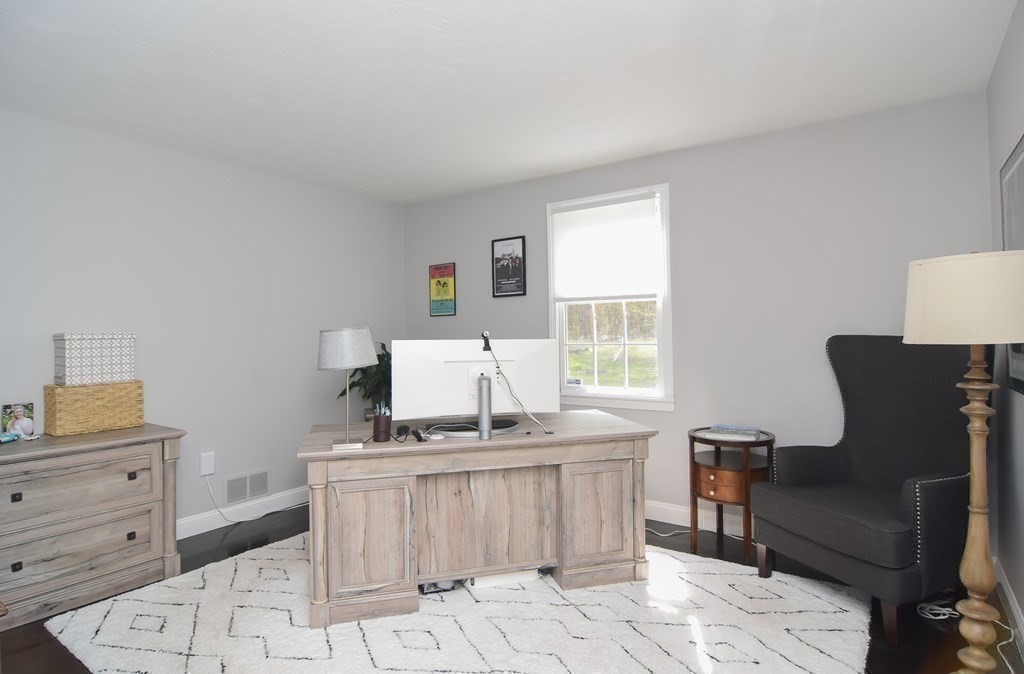 151 School Street Acton, MA 01720 - Photo 14 of 39 a living room with furniture and a window