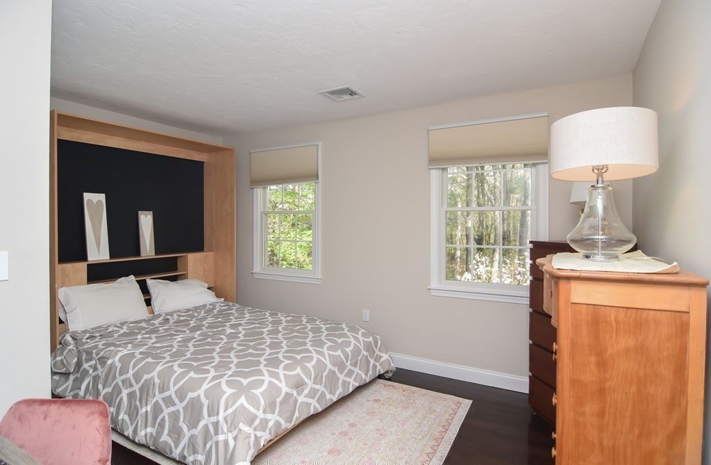 151 School Street Acton, MA 01720 - Photo 16 of 39 a bedroom with a bed and a window