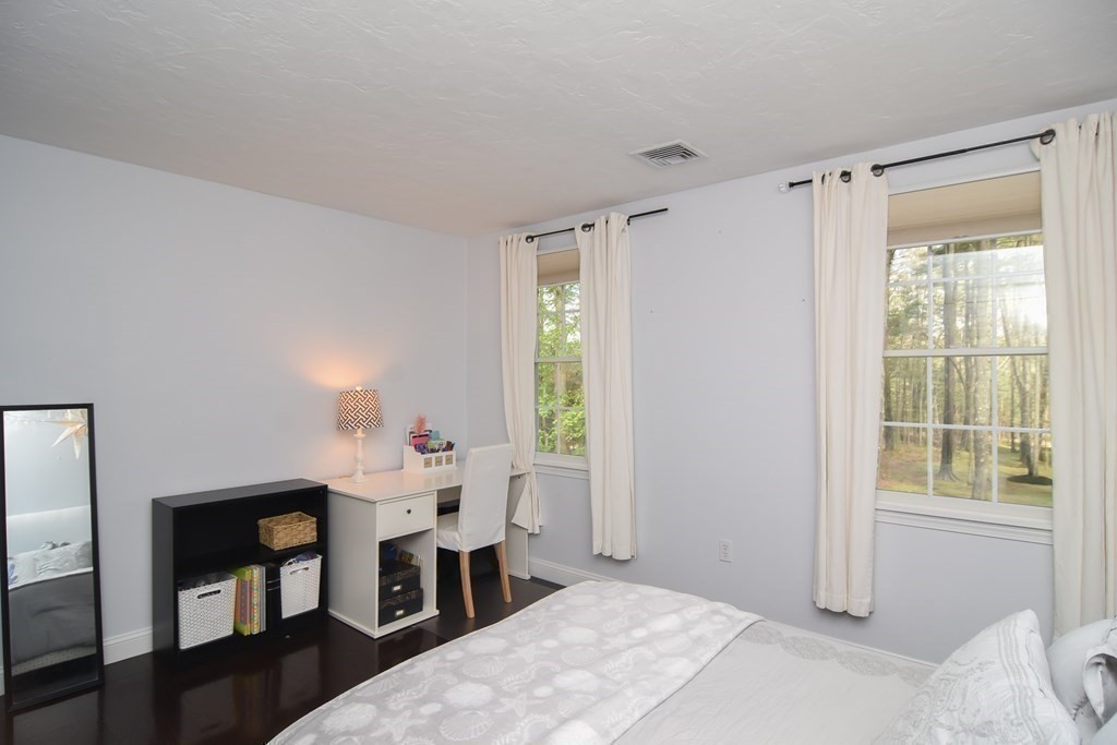 151 School Street Acton, MA 01720 - Photo 18 of 39 a bedroom with a bed and a window