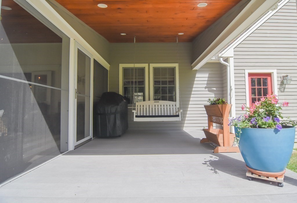 151 School Street Acton, MA 01720 - Photo 32 of 39 a view of a porch with furniture
