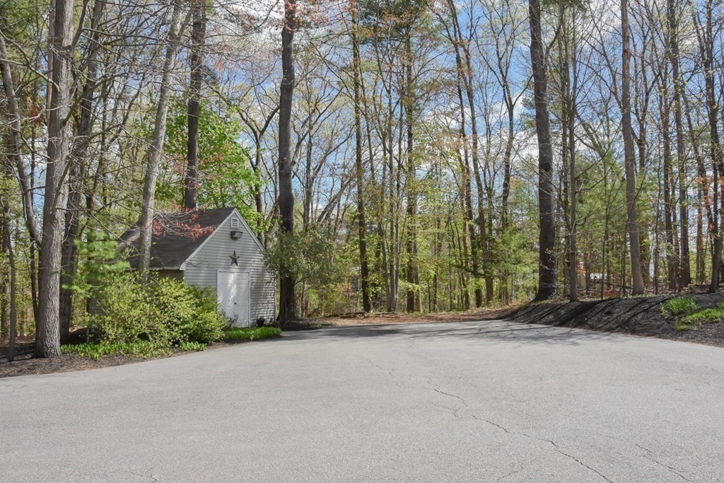 151 School Street Acton, MA 01720 - Photo 33 of 39 a view of a house with a yard and tree s