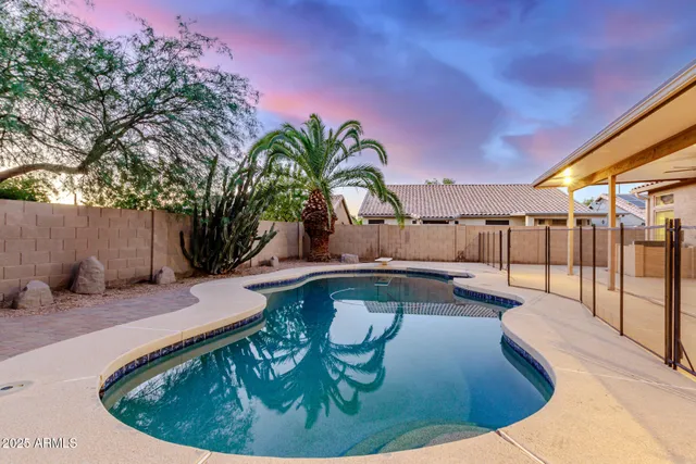 a view of swimming pool having outdoor seating