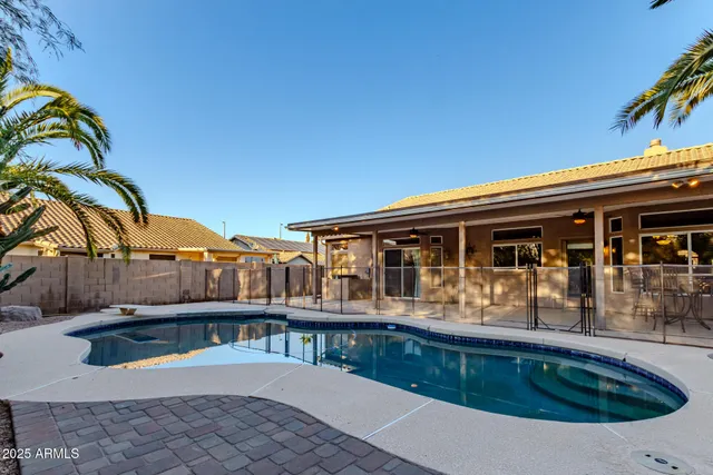 a front view of a house with swimming pool
