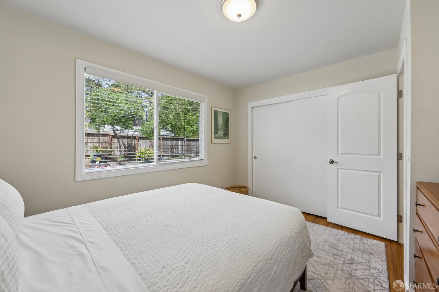 4052 Costado Road Pebble Beach, CA 93953 - Photo 22 of 35 a bedroom with a bed and a window