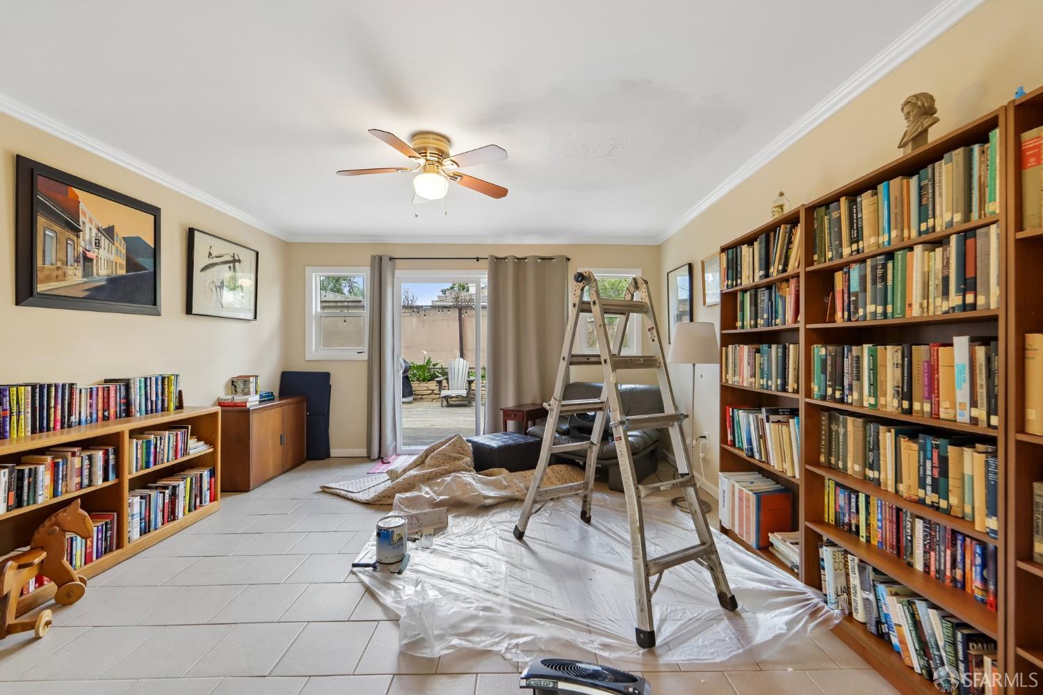 4052 Costado Road Pebble Beach, CA 93953 - Photo 28 of 35 a view of a living room with furniture and book shelf