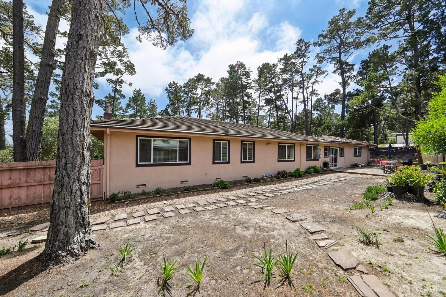 4052 Costado Road Pebble Beach, CA 93953 - Photo 35 of 35 a front view of a house with garden