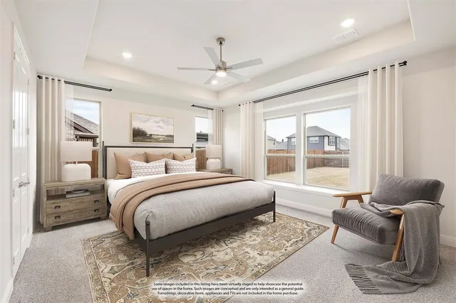 a bed room with a bed and a couch