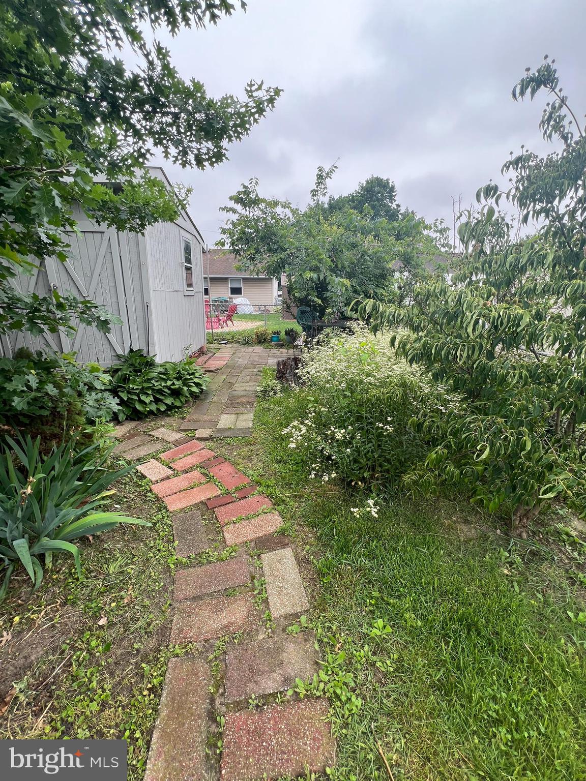 44 Midway Lane Bellmawr, NJ 08031 - Photo 11 of 28 a backyard of a house with lots of green space