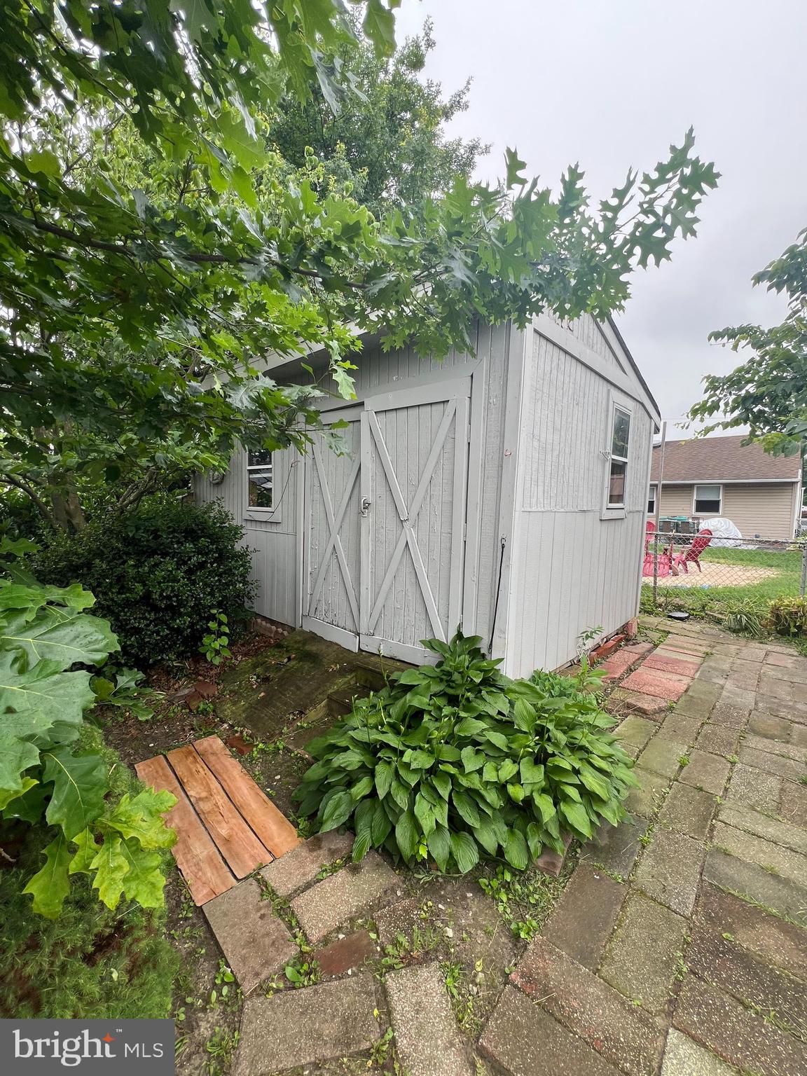 44 Midway Lane Bellmawr, NJ 08031 - Photo 12 of 28 a backyard of a house with lots of green space