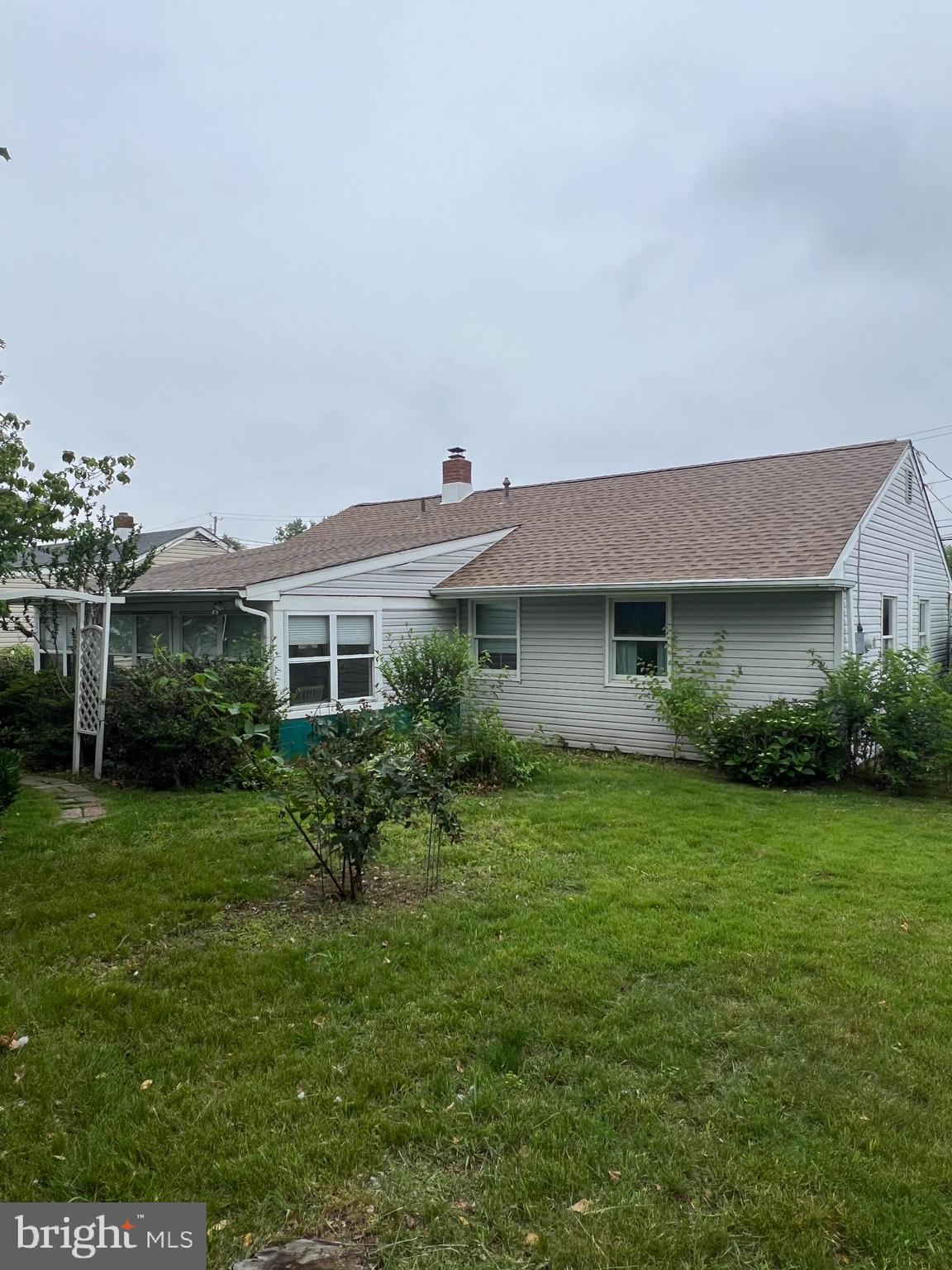 44 Midway Lane Bellmawr, NJ 08031 - Photo 16 of 28 a front view of house with a garden