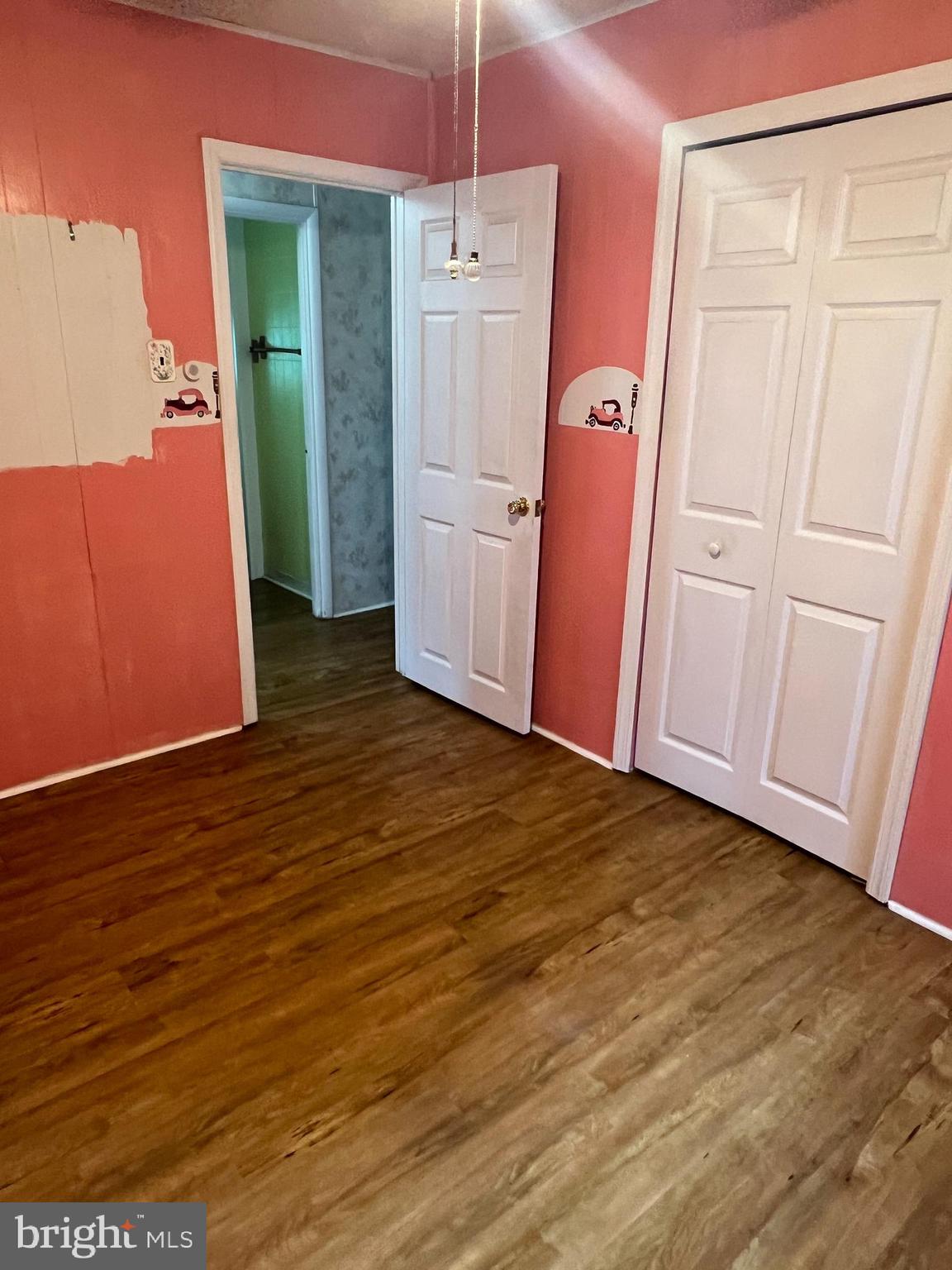 44 Midway Lane Bellmawr, NJ 08031 - Photo 21 of 28 a view of a room with wooden floor and cabinet