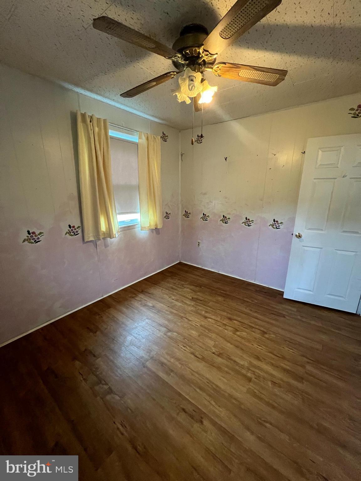 44 Midway Lane Bellmawr, NJ 08031 - Photo 26 of 28 an empty room with wooden floor and windows