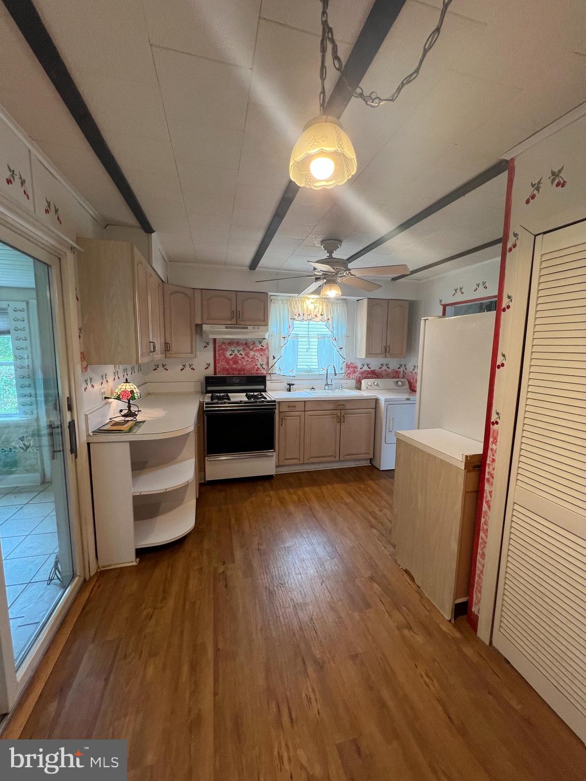 44 Midway Lane Bellmawr, NJ 08031 - Photo 7 of 28 a kitchen with refrigerator and cabinets